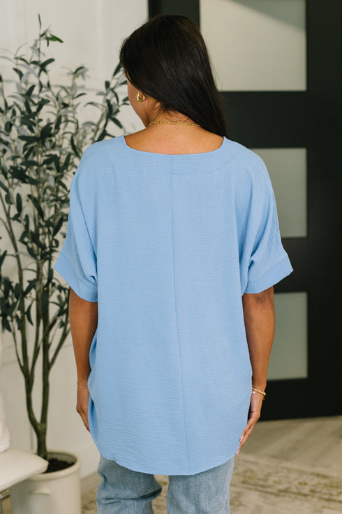 Counter Part Crinkle Woven V-Neck Top in Cornflower Blue