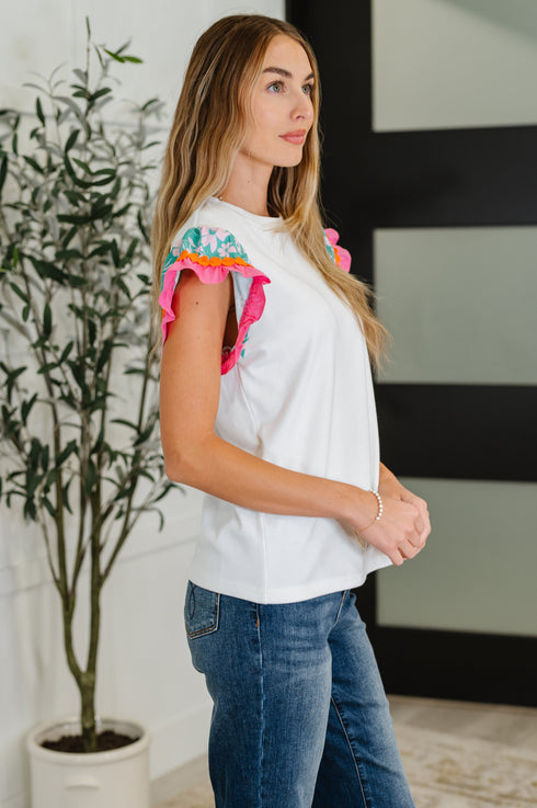 Petals & Poise Floral Flutter Sleeve Top in White